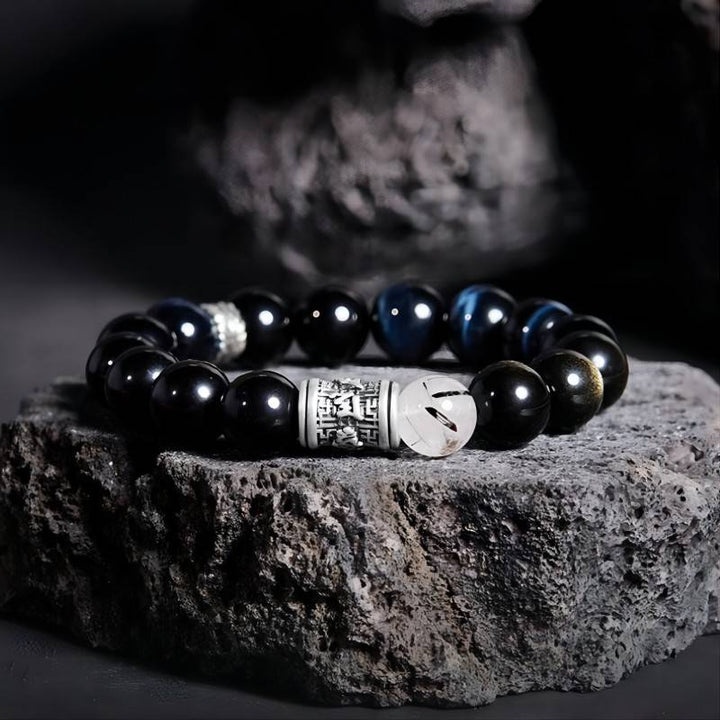 Mantra of Fortune Bracelet - Protection &amp; Flow - Prop styling shot of black obsidian bracelet