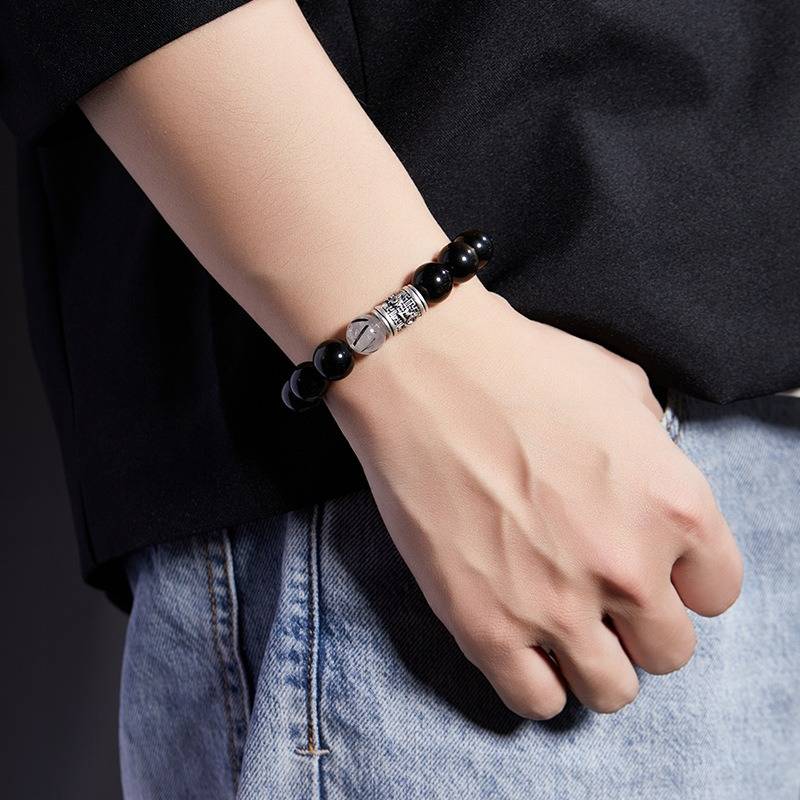 Mantra of Fortune Bracelet - Protection &amp; Flow - On wrist shot of black obsidian bracelet