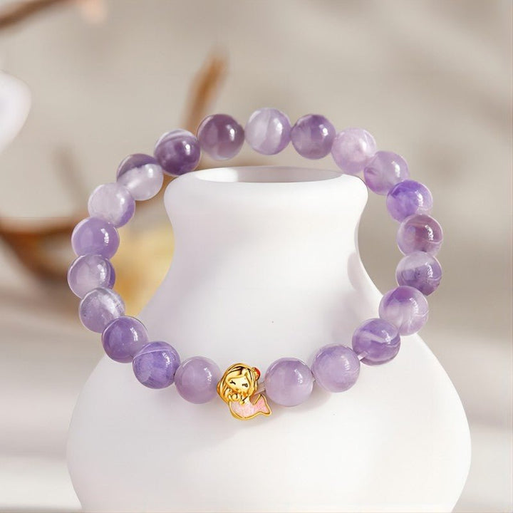 Mermaid Charm Bracelet With Amethyst Beads For Whimsical Style - Magic &amp; Dreams - prop-styled shot