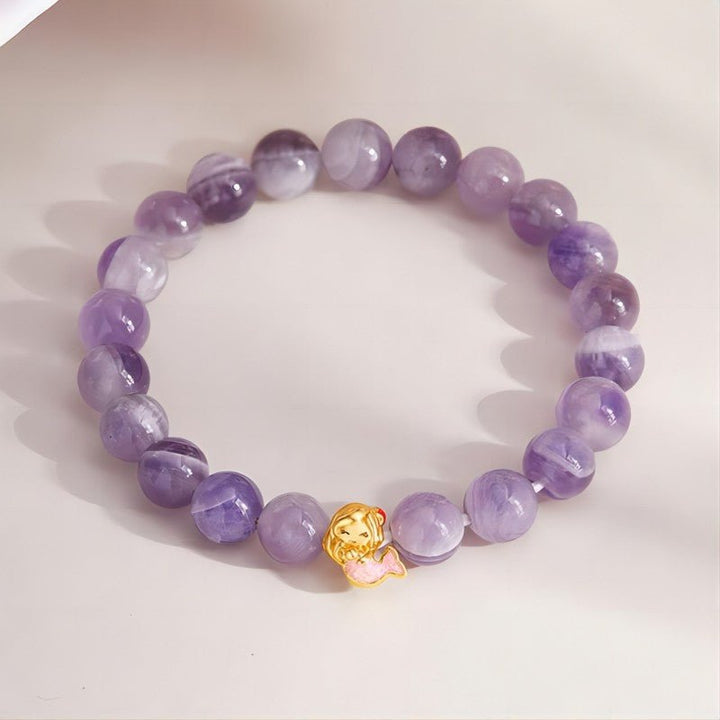 Mermaid Charm Bracelet With Amethyst Beads For Whimsical Style - Magic &amp; Dreams - top view staged shot