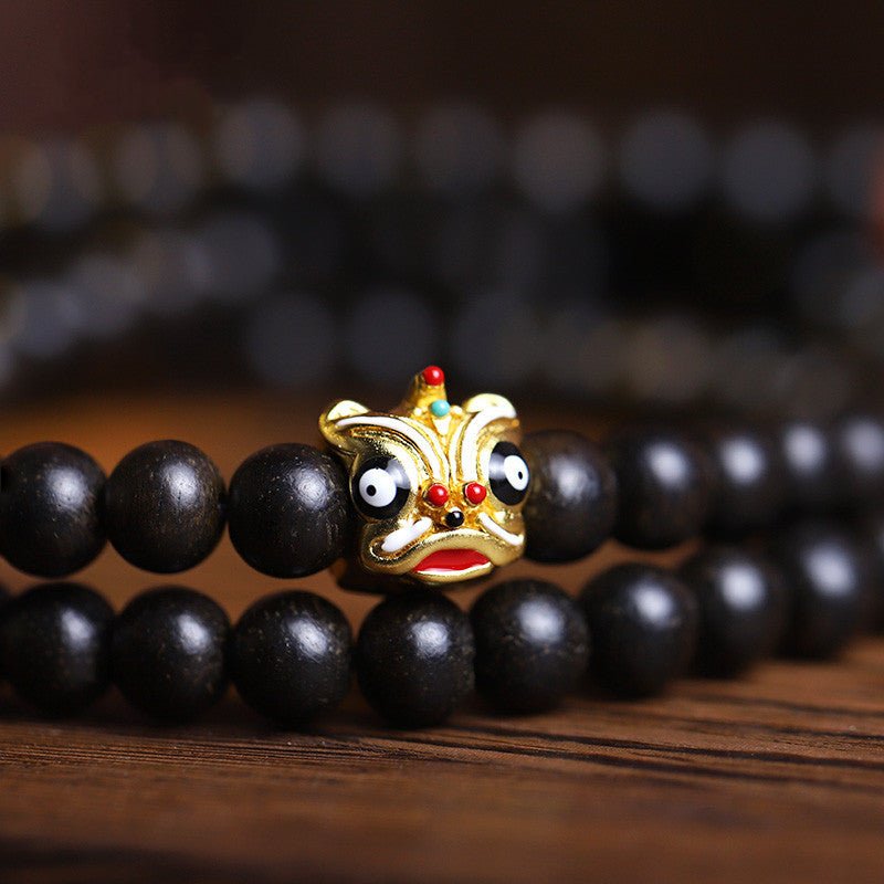 Natural Agarwood Prayer Beads With Lion Dance Charm - Vitality • Protection • Heritage - close up of 108 agarwood bracelet