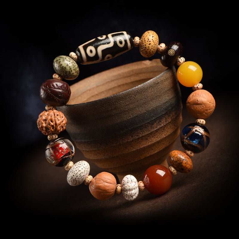 Nine - Eye Dzi &amp; Bodhi Seed Multi - Treasure Bracelet - Protection &amp; Harmony - front view Prop Styling