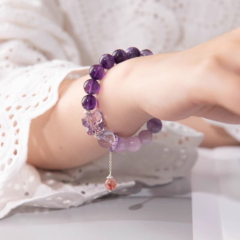 Nine Purple Fire Transformation Bracelet - Calm &amp; Protection - On wrist shot of amethyst bracelet 1