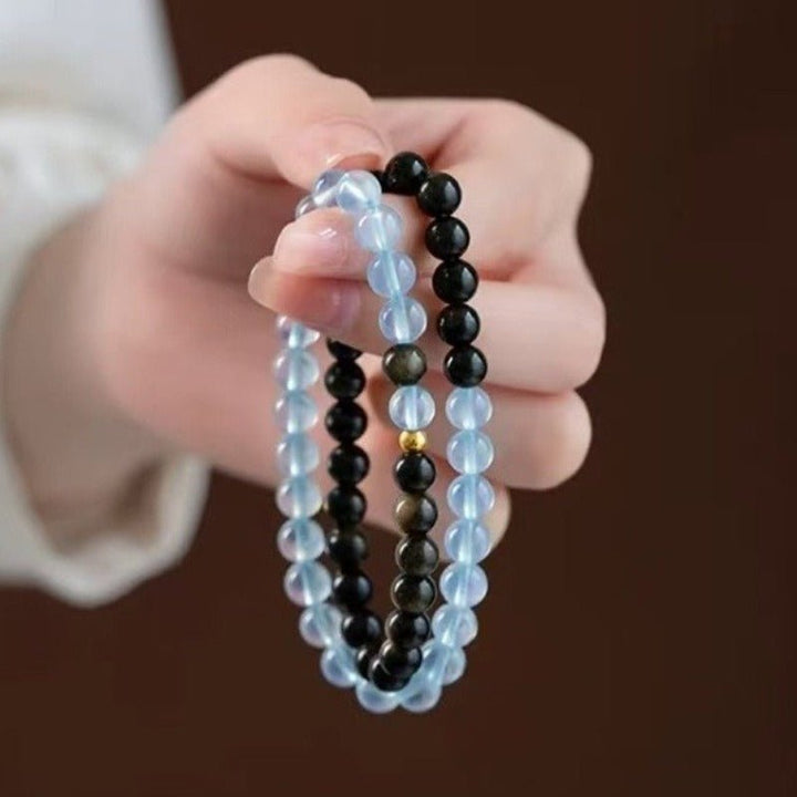 Obsidian &amp; Aquamarine Stackable Guardian Duo Bracelet - Calm &amp; Clarity - side view on-hand shot