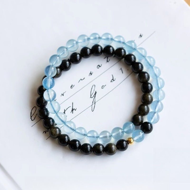 Obsidian & Aquamarine Stackable Guardian Duo Bracelet - Calm & Clarity - top view staged shot