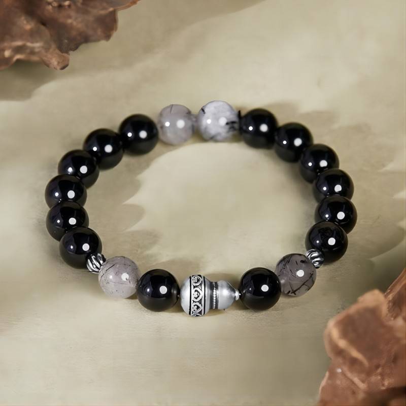 Obsidian Bracelet With Aged Silver Gourd For Fortune & Peace - Staged shot