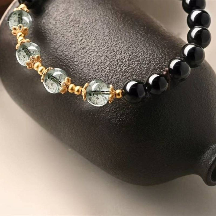 Obsidian &amp; Green Phantom Quartz Abundance and Guarding Bracelet - Good Fortune &amp; Harmony - close up prop-styled shot