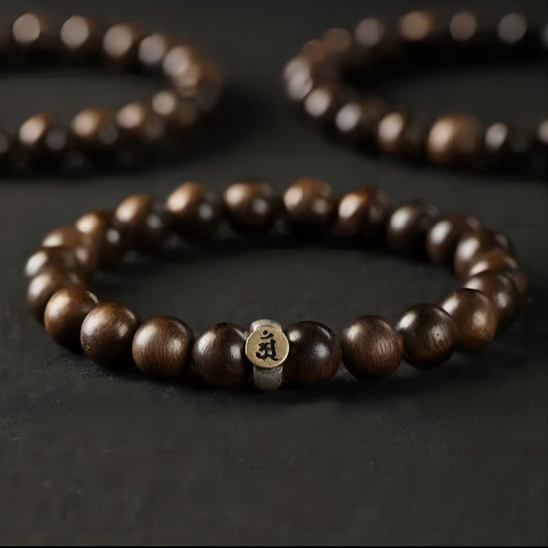 Personal Guardian Sanskrit Zodiac Charm Agarwood Bracelet - Peace & Smooth Fortune - close-up shot for chinese zodiac bead