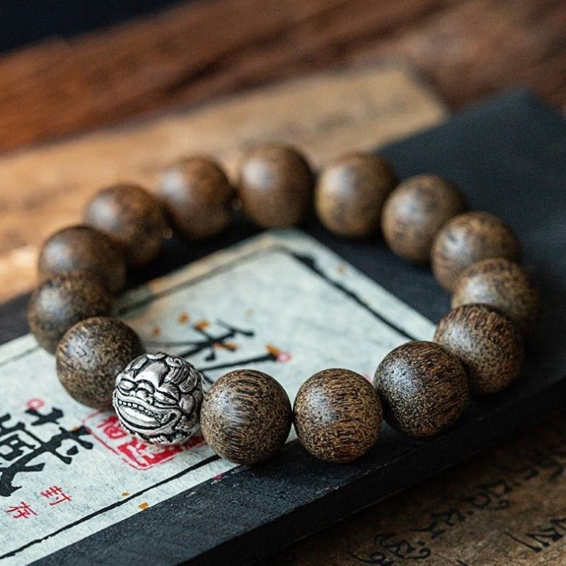 Pixiu Wealth Guardian Bracelet - Protection • Grounding • Focus - prop styling shot 1