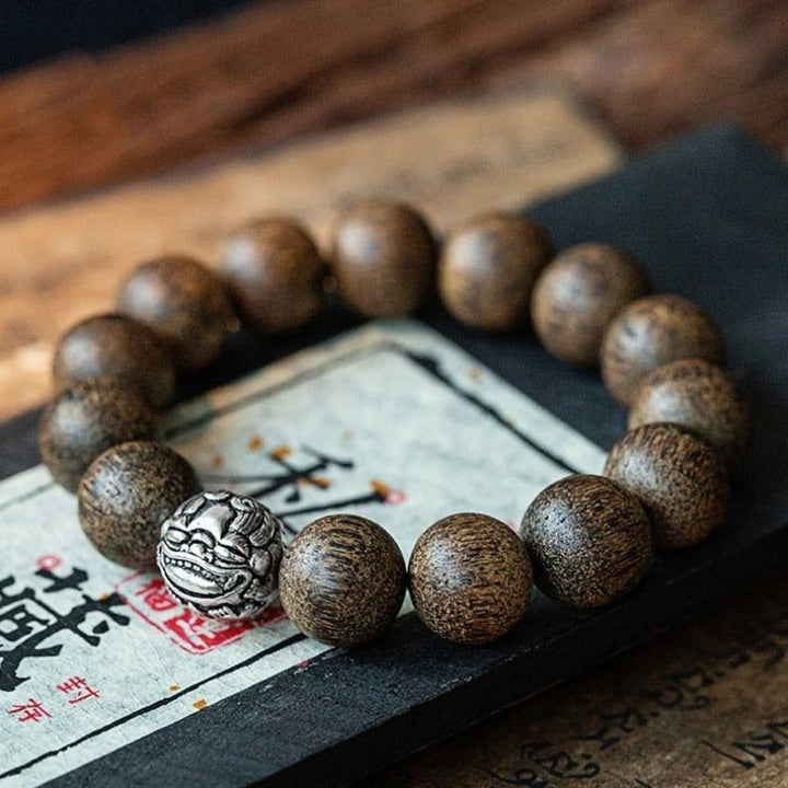 Pixiu Wealth Guardian Bracelet - Protection • Grounding • Focus - prop styling shot 1
