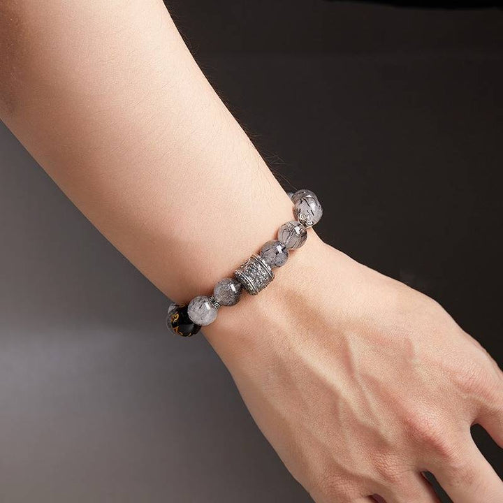 Protection and Blessing Mantra Bead Bracelet - Grounding &amp; Good Fortune - on wrist shot of the Black Obsidian bracelet