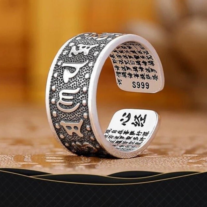 Protection Mantra Charm Ring - Good Fortune & Calm - Staged shot of sterling sliver ring