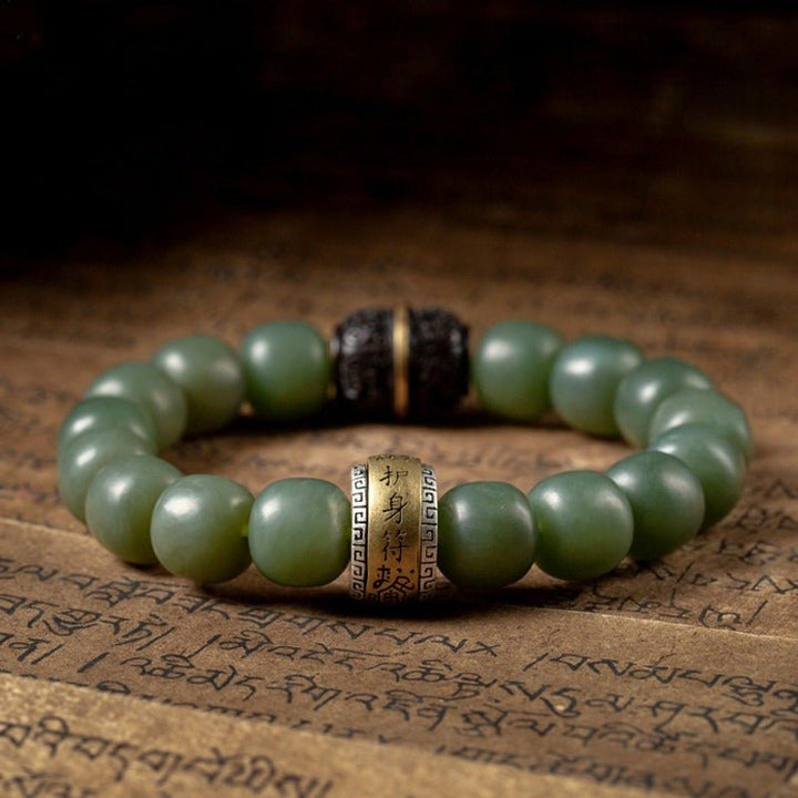 Protection Talisman Drum Hetian Jade Bead Bracelet - Serenity &amp; Safe Passage - staged close up shot