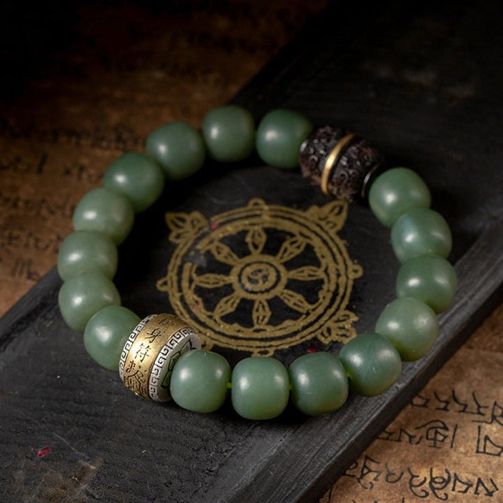 Protection Talisman Drum Hetian Jade Bead Bracelet - Serenity &amp; Safe Passage - prop styling shot