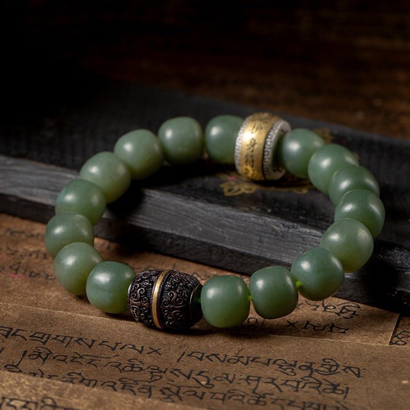 Protection Talisman Drum Hetian Jade Bead Bracelet - Serenity & Safe Passage - prop styling close up shot