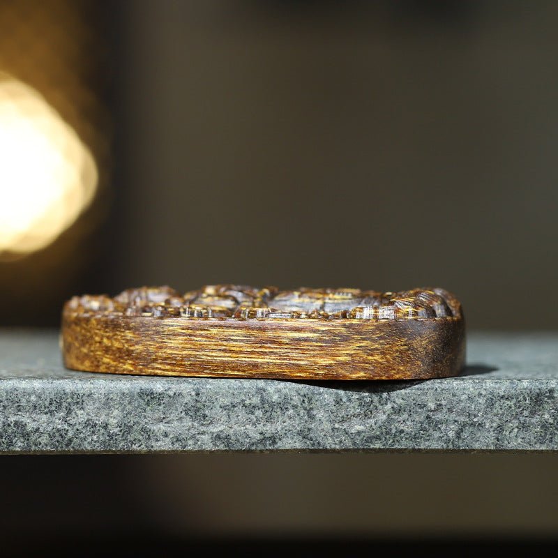 Protective Thousand-Armed Avalokitesvara Standing Pendant - Compassion &amp; Peace - side view of the agarwood pendant
