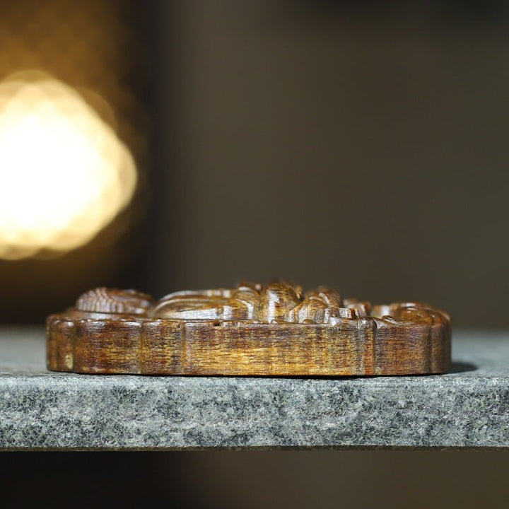 Protective Vairocana Buddha Pendant - Blessing &amp; Peace - side view of agarwood pendant