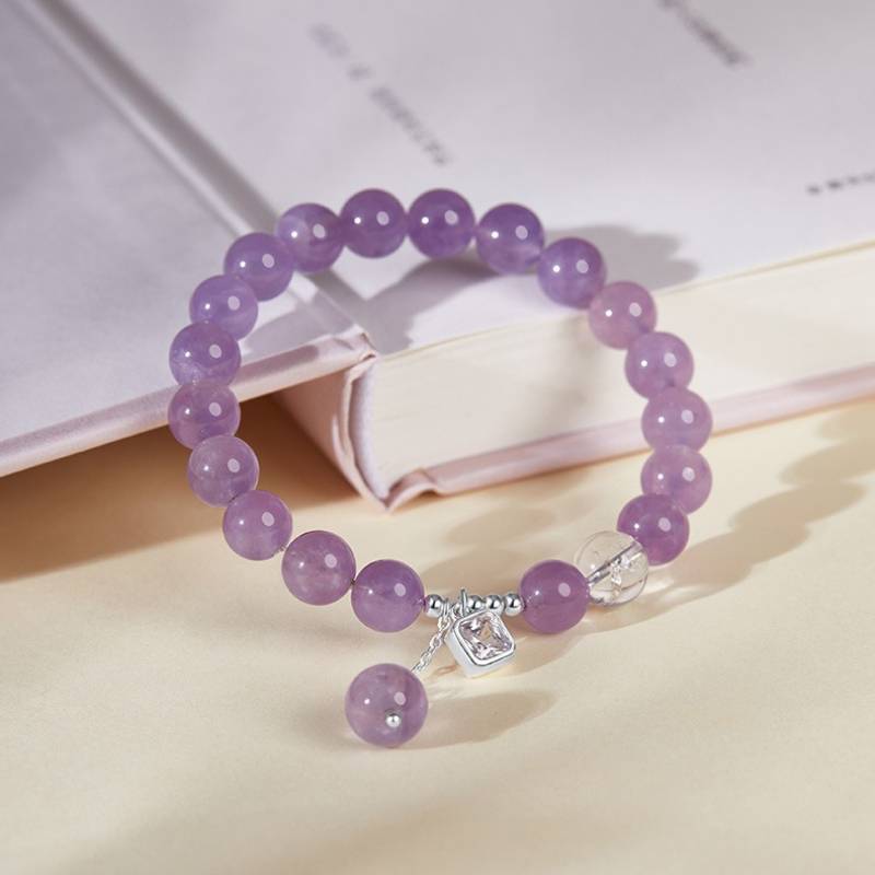 Purple Flame Harmony Amethyst Bracelet With Cubic Zirconia - prop-styled close-up shot