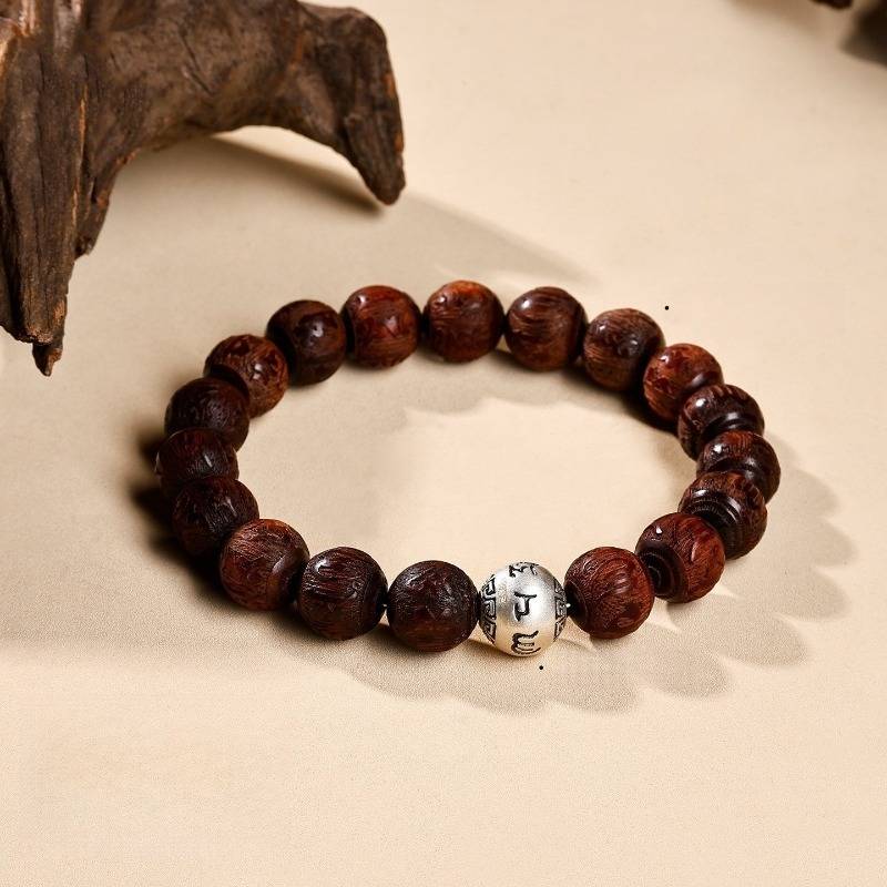 Sacred Mantra Engraved Sandalwood Bracelet - Peace & Smooth Fortune - prop-styled shot