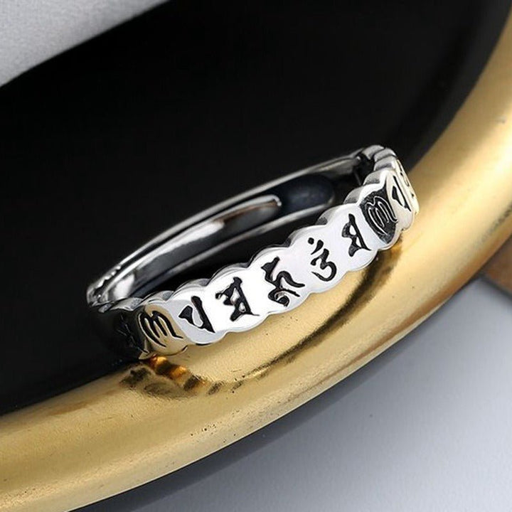 Sacred Protection Mantra Charm Ring - Blessing &amp; Calm - Side view staged shot of sterling sliver ring