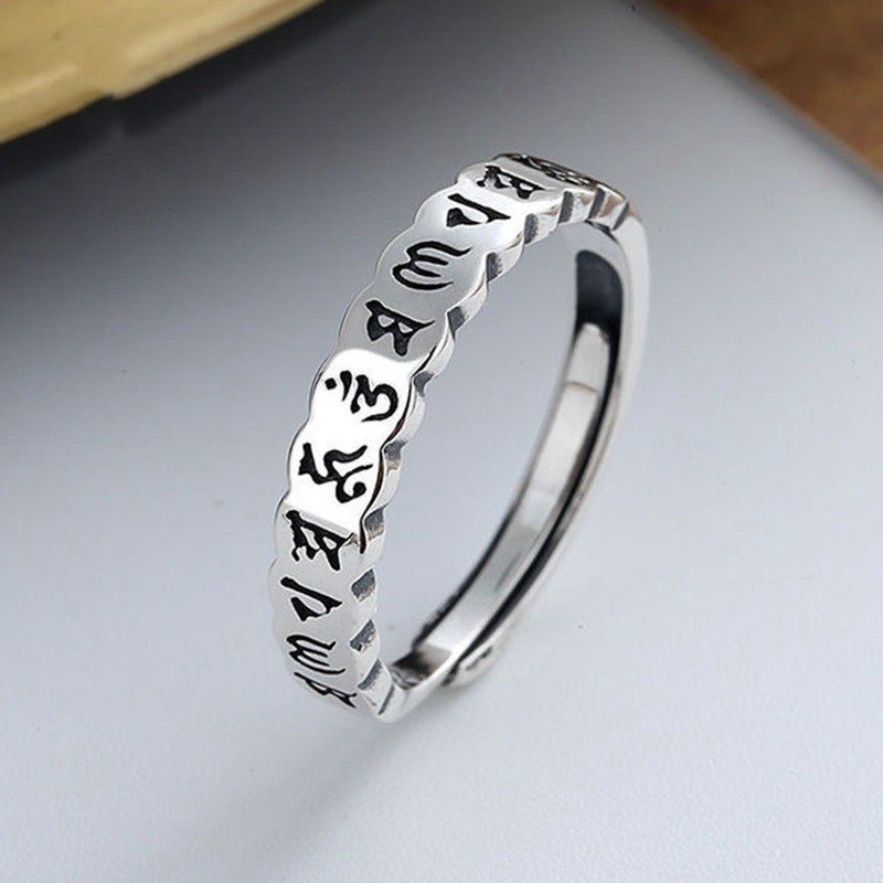 Sacred Protection Mantra Charm Ring - Blessing & Calm - Staged shot of sterling sliver ring