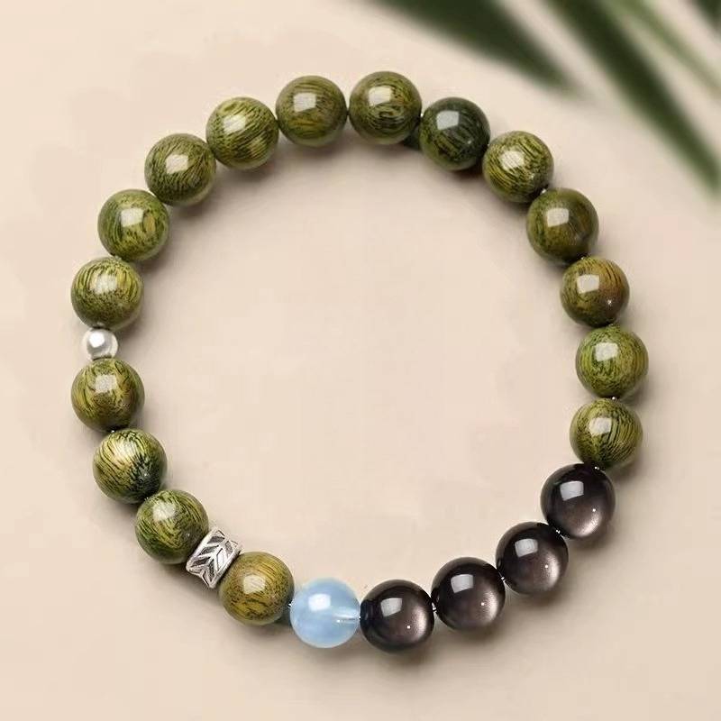 Serene Guardian Wood Bead Bracelet - Peace & Good Fortune - top view staged shot with green sandalwood beads