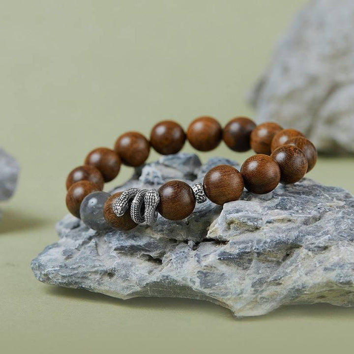 Serpentine Fortune Sandalwood Bracelet - Calm • Clarity • Harmony - prop-styled shot 1