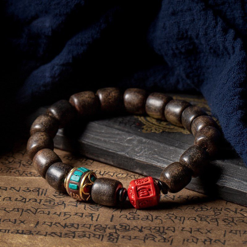 Six - Syllable Mantra  Agarwood Bracelet - Wisdom & Protection - prop styling shot