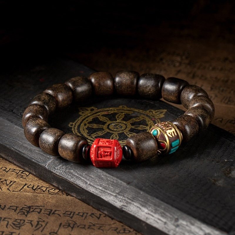 Six - Syllable Mantra  Agarwood Bracelet - Wisdom & Protection - staged shot
