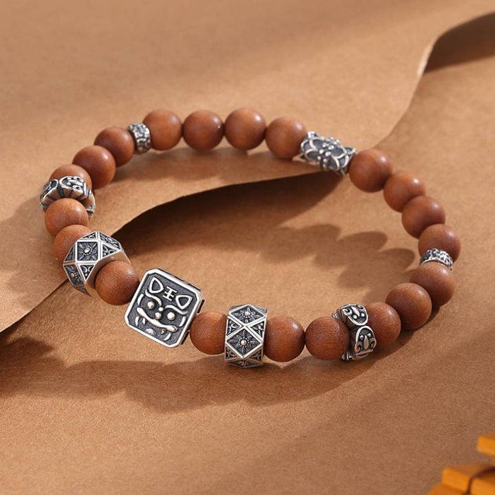 Sterling Sliver Tiger Head Bead Sandalwood Bracelet - Clarity • Protection • Elegance - prop-styled shot 1