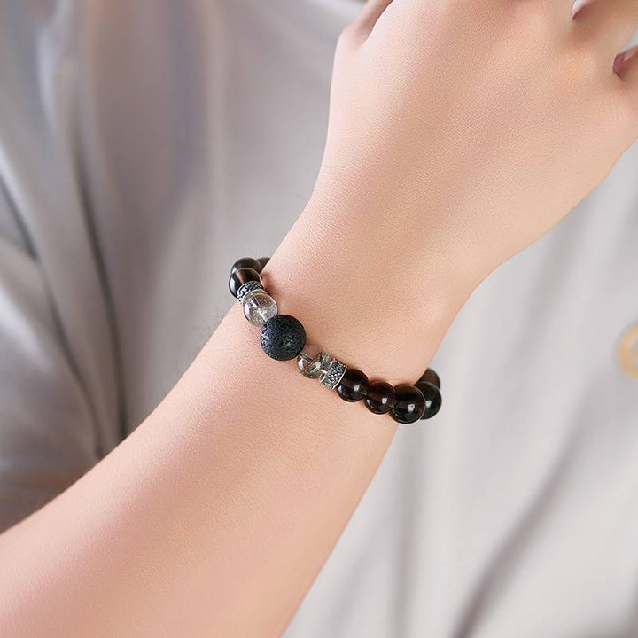 Titanium Soul Obsidian Bracelet - Grounding • Prosperity • Self - Mastery - On wrist wearing display