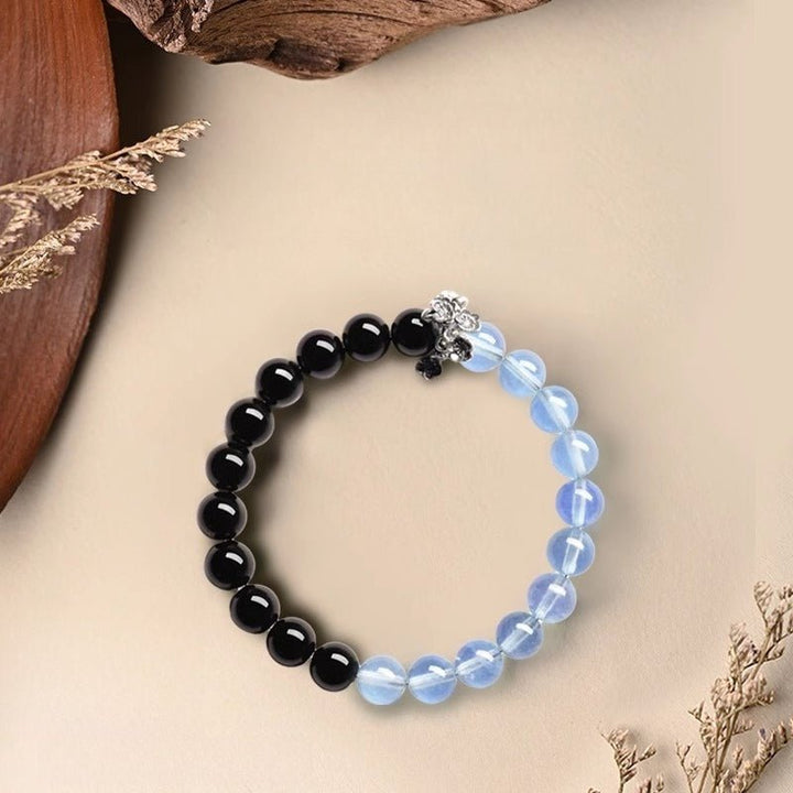 Tranquil Guardian Aquamarine &amp; Obsidian Bracelet - Good Fortune &amp; Serenity - Top view staged shot