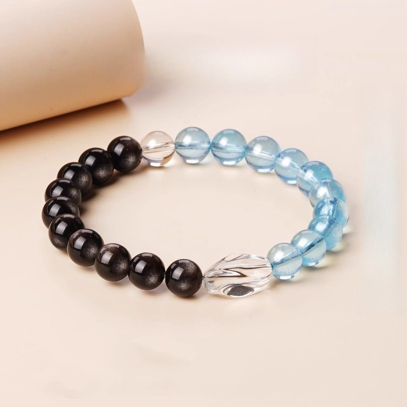 Tranquil Guardian Aquamarine & Silver Sheen Obsidian Bracelet With Optional Lucky Stone - Prop styling shot