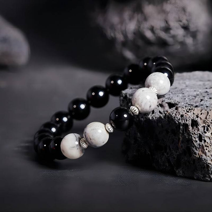 Urban Edge Obsidian Bracelet - Grounding &amp; Intuition - prop-styled shot
