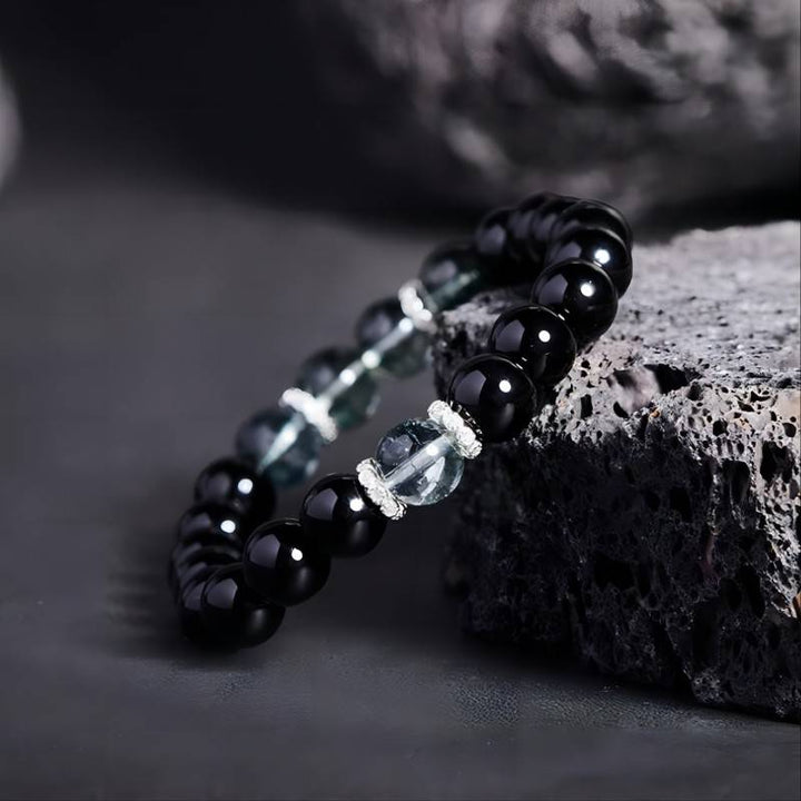 Wealth Attraction Obsidian Bracelet With Green Phantom Quartz - Side view prop styling shot