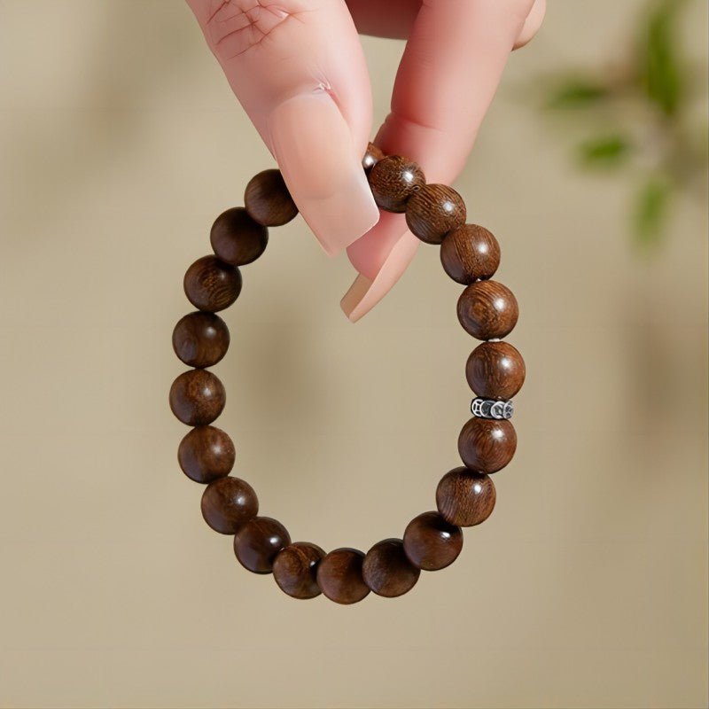 Wealth Attraction Sandalwood Bracelet - Calm • Clarity • Harmony - on-hand shot