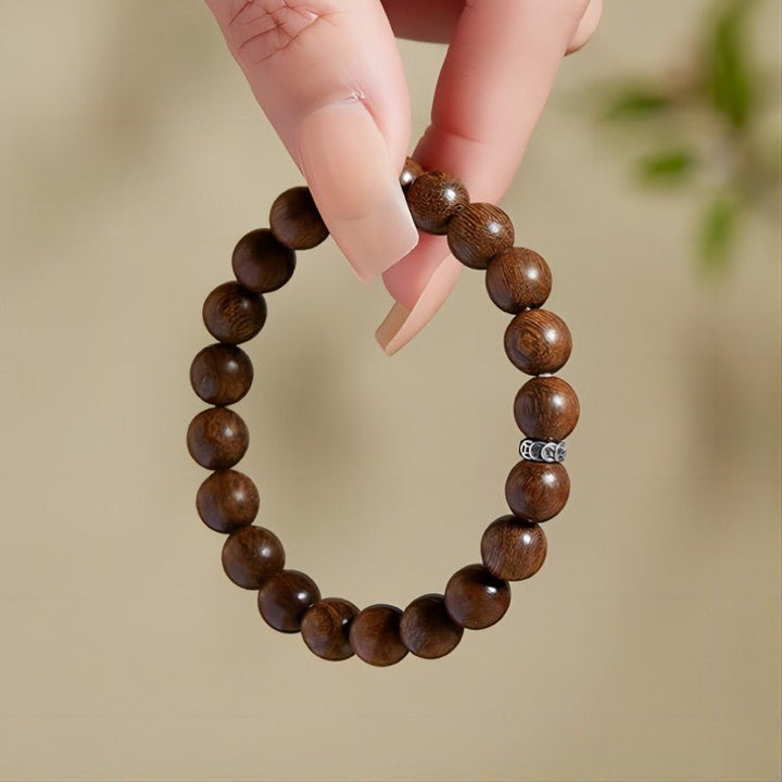 Wealth Attraction Sandalwood Bracelet - Calm • Clarity • Harmony - on-hand shot