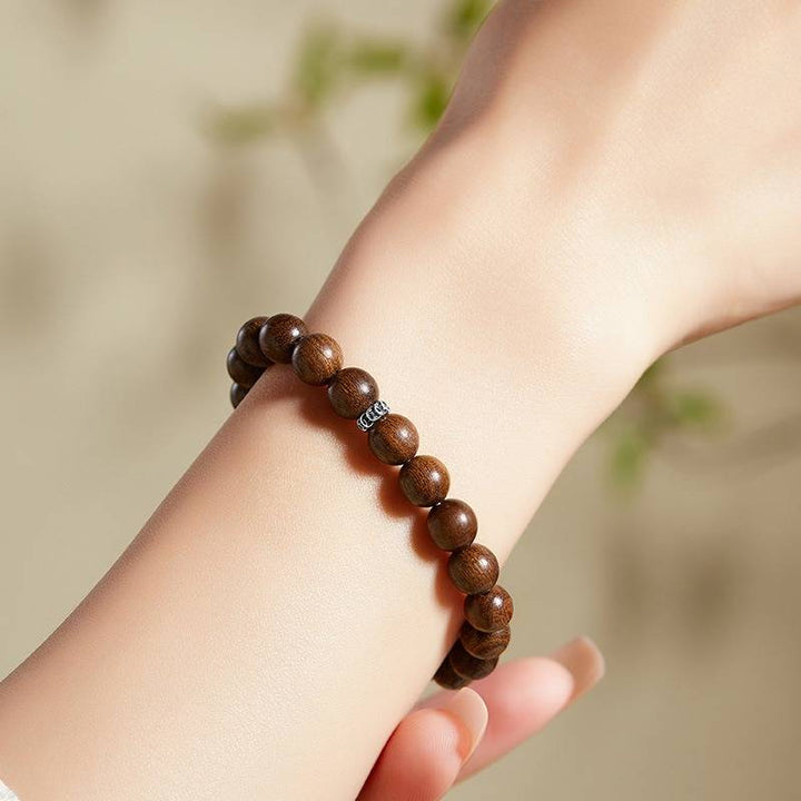 Wealth Attraction Sandalwood Bracelet - Calm • Clarity • Harmony - on wrist shot
