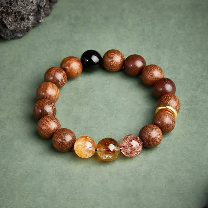 Wealth Flow &amp; Protection Sandalwood And Crystal Bracelet - Clarity • Grounding • Momentum - top view staged shot
