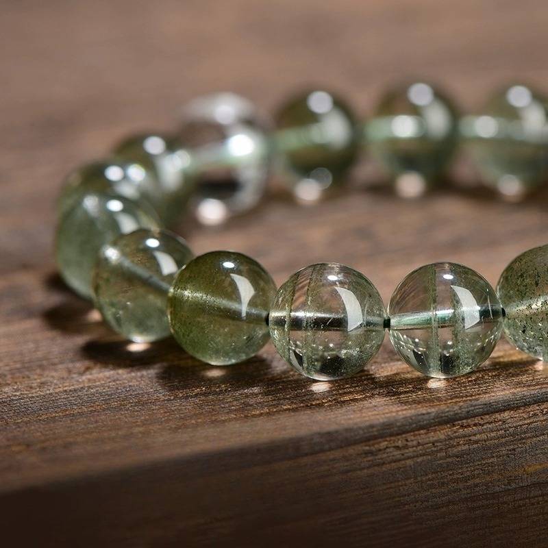 Wealth Guardian Chinese Zodiac Buddha Charm Bracelet - close-up shot with green phantom crystal main beads