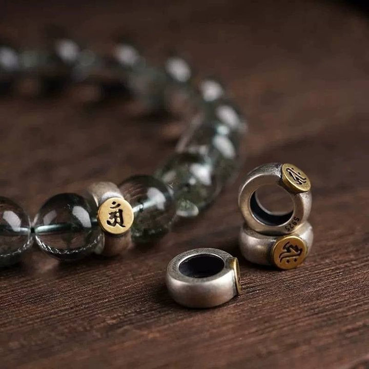 Wealth Guardian Chinese Zodiac Buddha Charm Bracelet - Peace &amp; Protection - closeup shot with green phantom for focal element