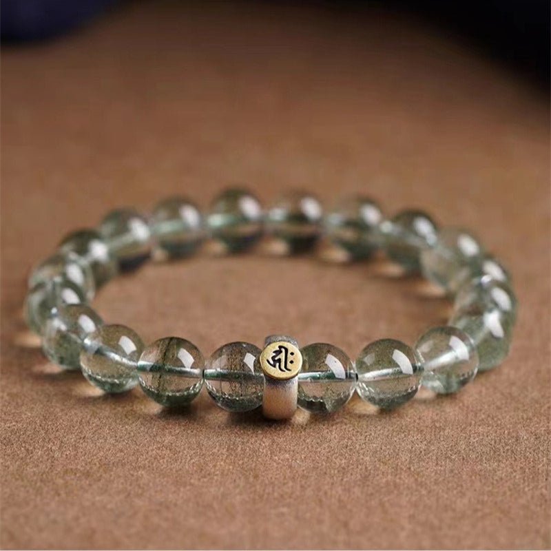 Wealth Guardian Chinese Zodiac Buddha Charm Bracelet - Peace & Protection - staged shot with green phantom crystal