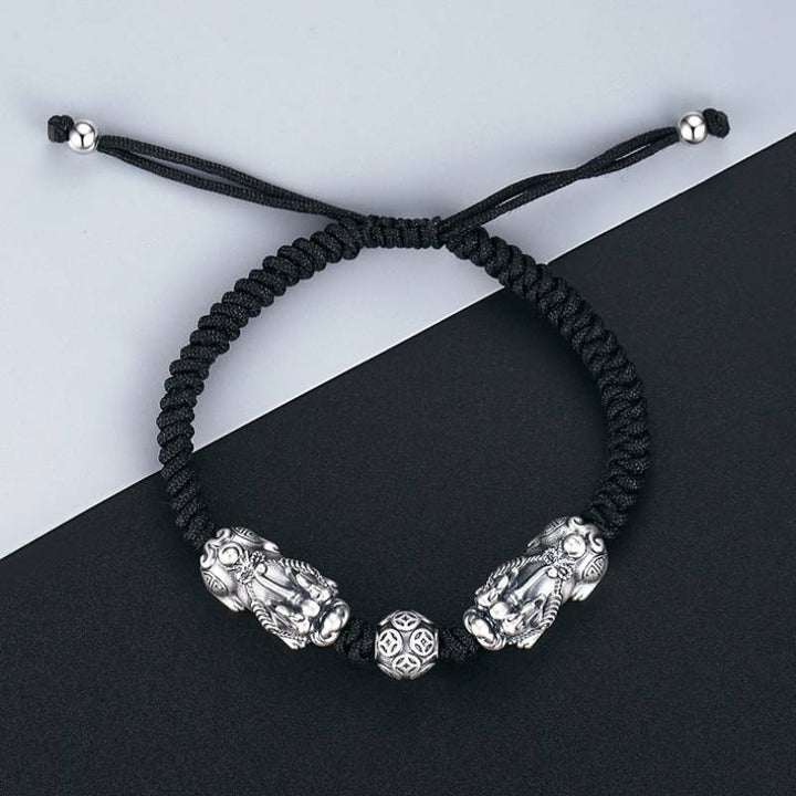 Wealth Guardian Double Sterling Sliver Pixiu Bracelet - Fortune • Prosperity • Abundance - top view prop-styled shot