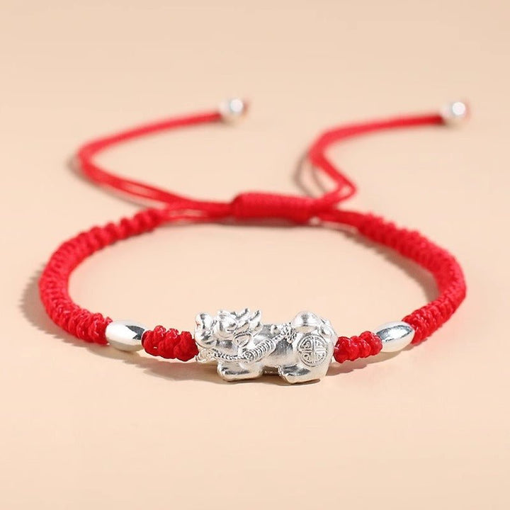 Wealth Guardian Pi Yao Charm Bracelet - Peace &amp; Protection - Staged shot of red style
