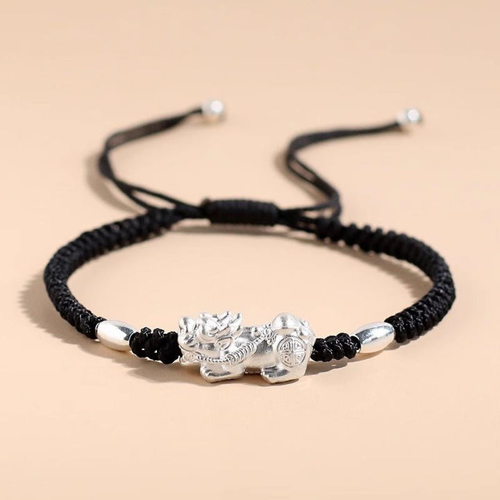 Wealth Guardian Pi Yao Charm Bracelet - Peace &amp; Protection - Prop styling shot of black style