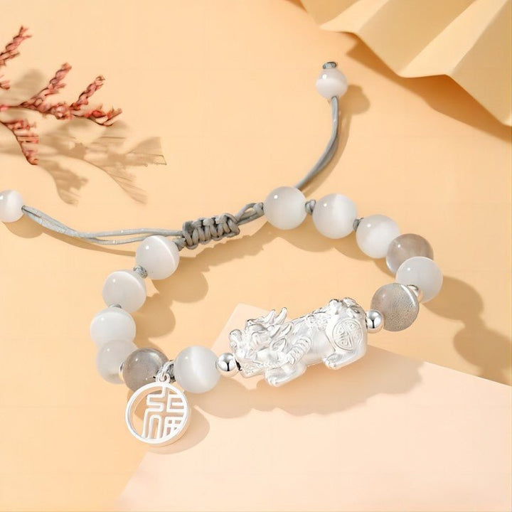 Wealth Guardian Pixiu Charm Bracelet - Protection &amp; Grounding - Staged shot of mix obsidian bracelet for women