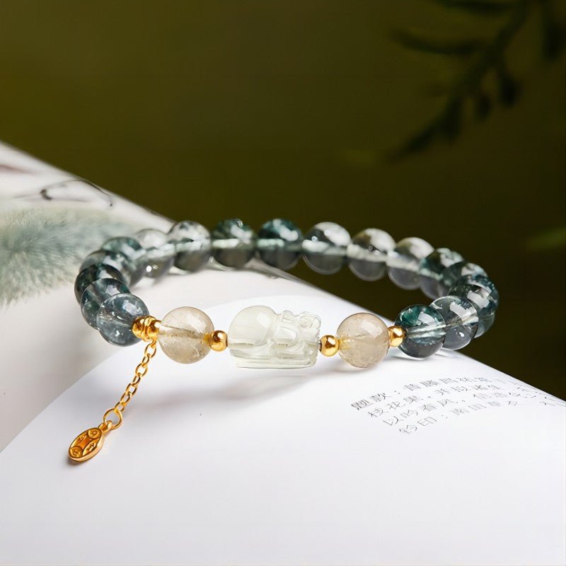 Wealth Guardian Pixiu Green Phantom Quartz Bracelet - Growth • Protection • Vitality - prop-styled shot