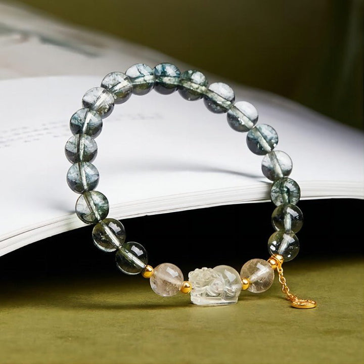 Wealth Guardian Pixiu Green Phantom Quartz Bracelet - Growth • Protection • Vitality - side view prop-styled shot