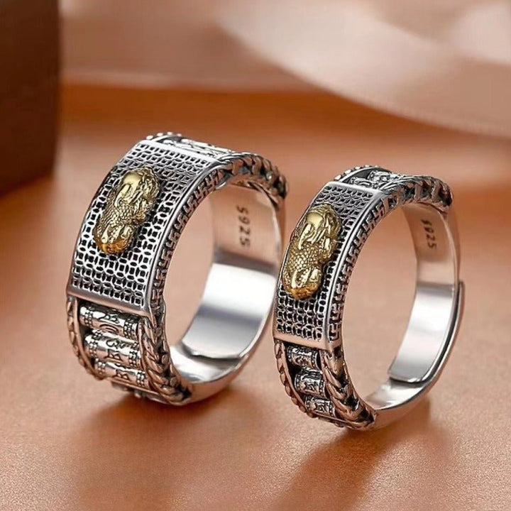 Wealth Guardian Pixiu &amp; Spinning Prayer Wheels Ring - Protection &amp; Serene Flow - close up shot of  two sterling sliver rings