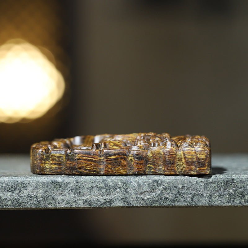 Wealth Guardian Winged Pixiu Pendant - Protection &amp; Celestial Blessing - side view of the agarwood pendant